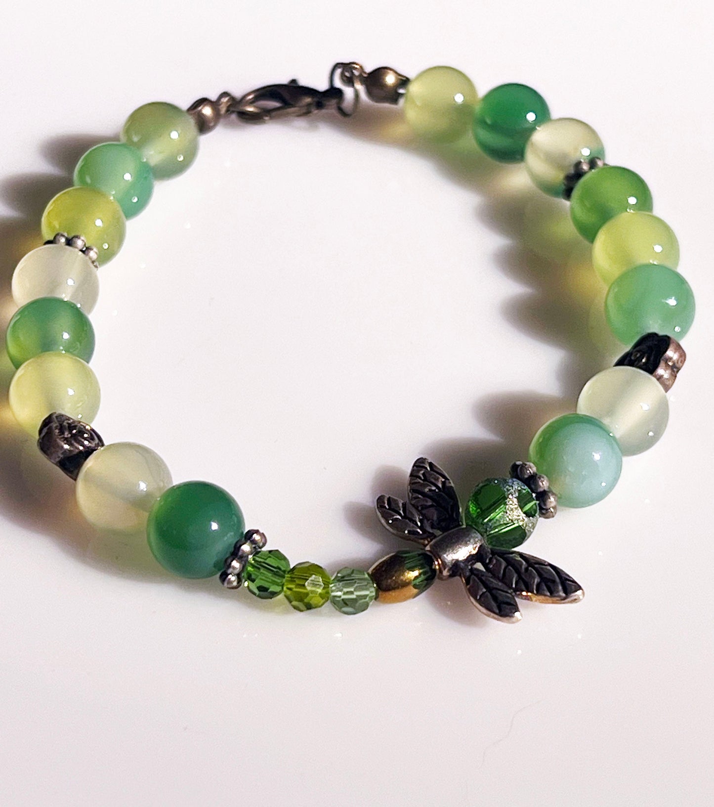 Prehnite Bracelet - Round beaded bracelet with dragonfly charm.