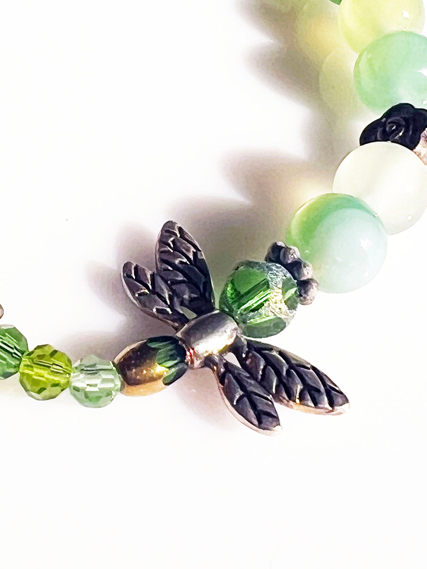 Prehnite Bracelet - Round beaded bracelet with dragonfly charm.