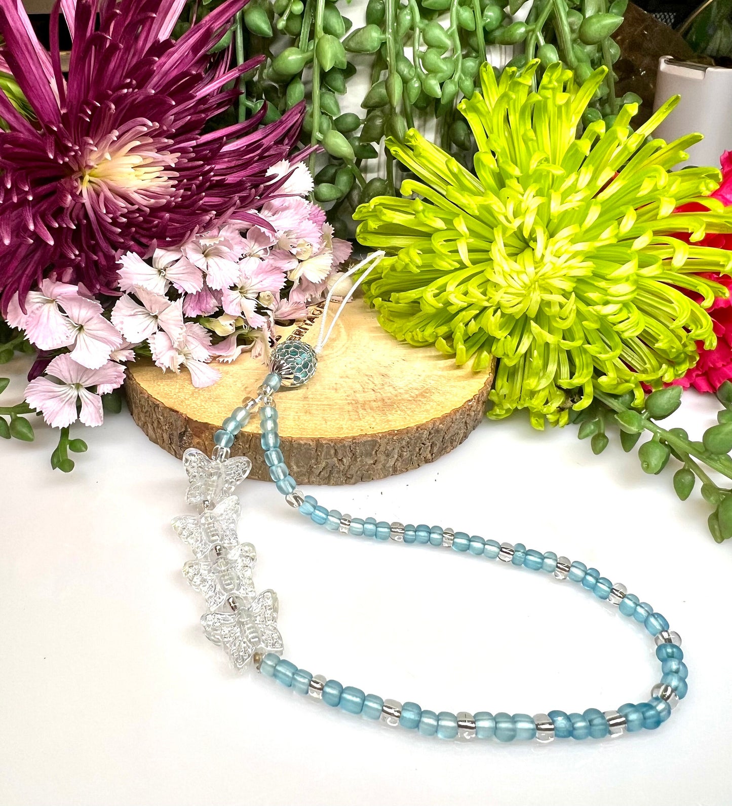 Blue Glass E-Beads with white Butterflies Phone Charm.