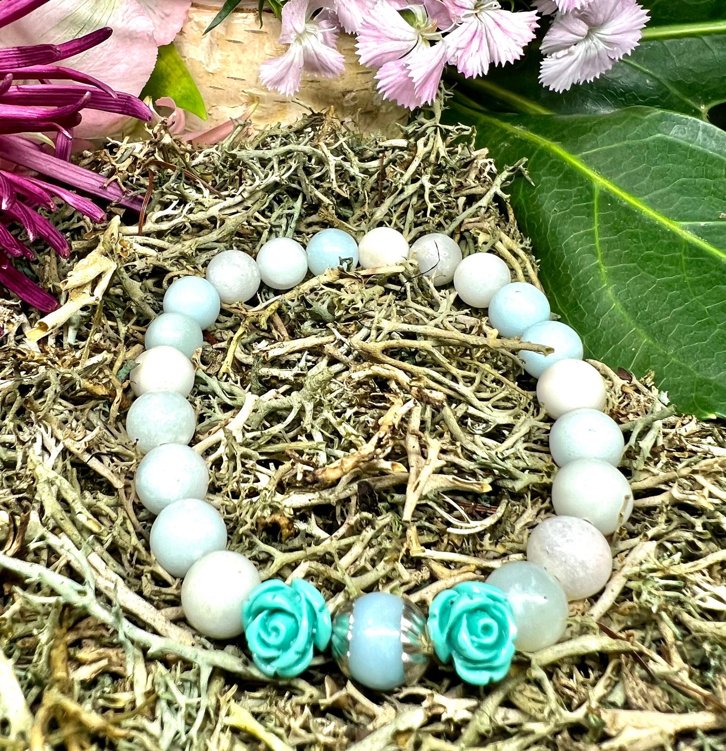 Iceland Spar Calcite 8mm bead stretchy bracelet with blue roses.