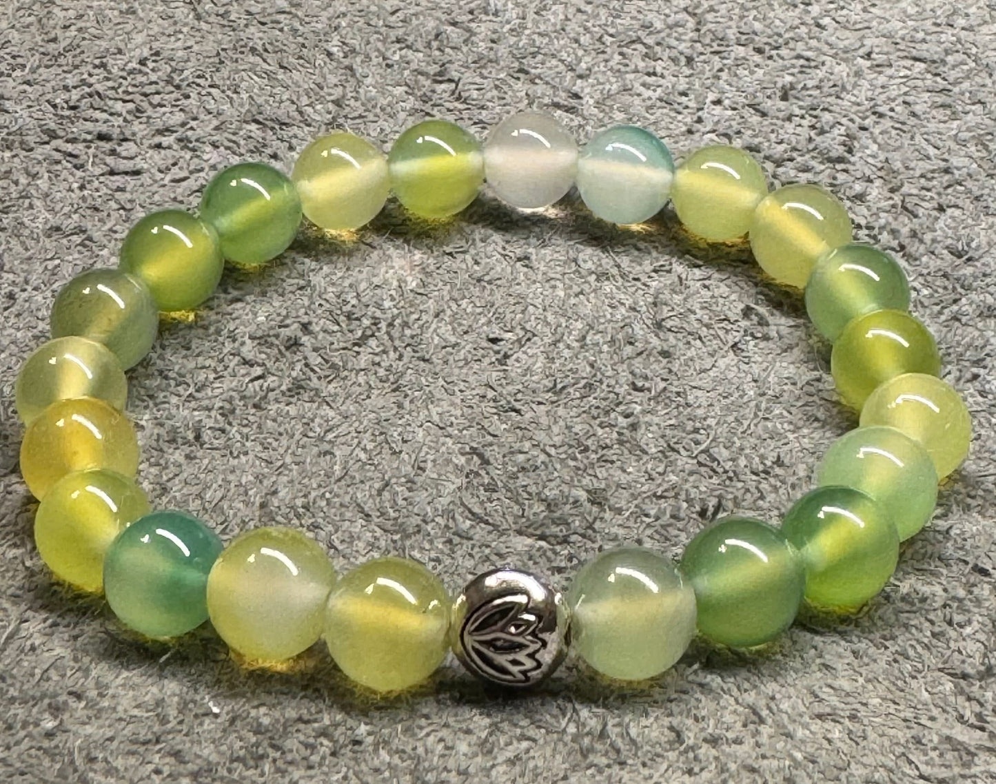 8mm Prehnite Gemstone Stretchy Bracelet with a Lotus Silver Bead.