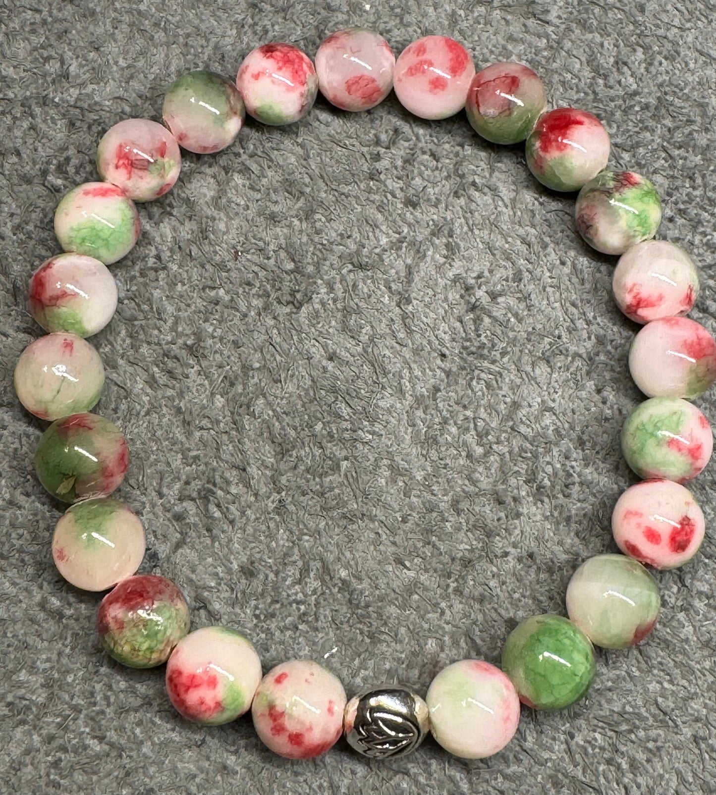 8mm Pink and Green Rain Flower Jade Gemstone Stretchy Bracelet with a Lotus Silver Bead.