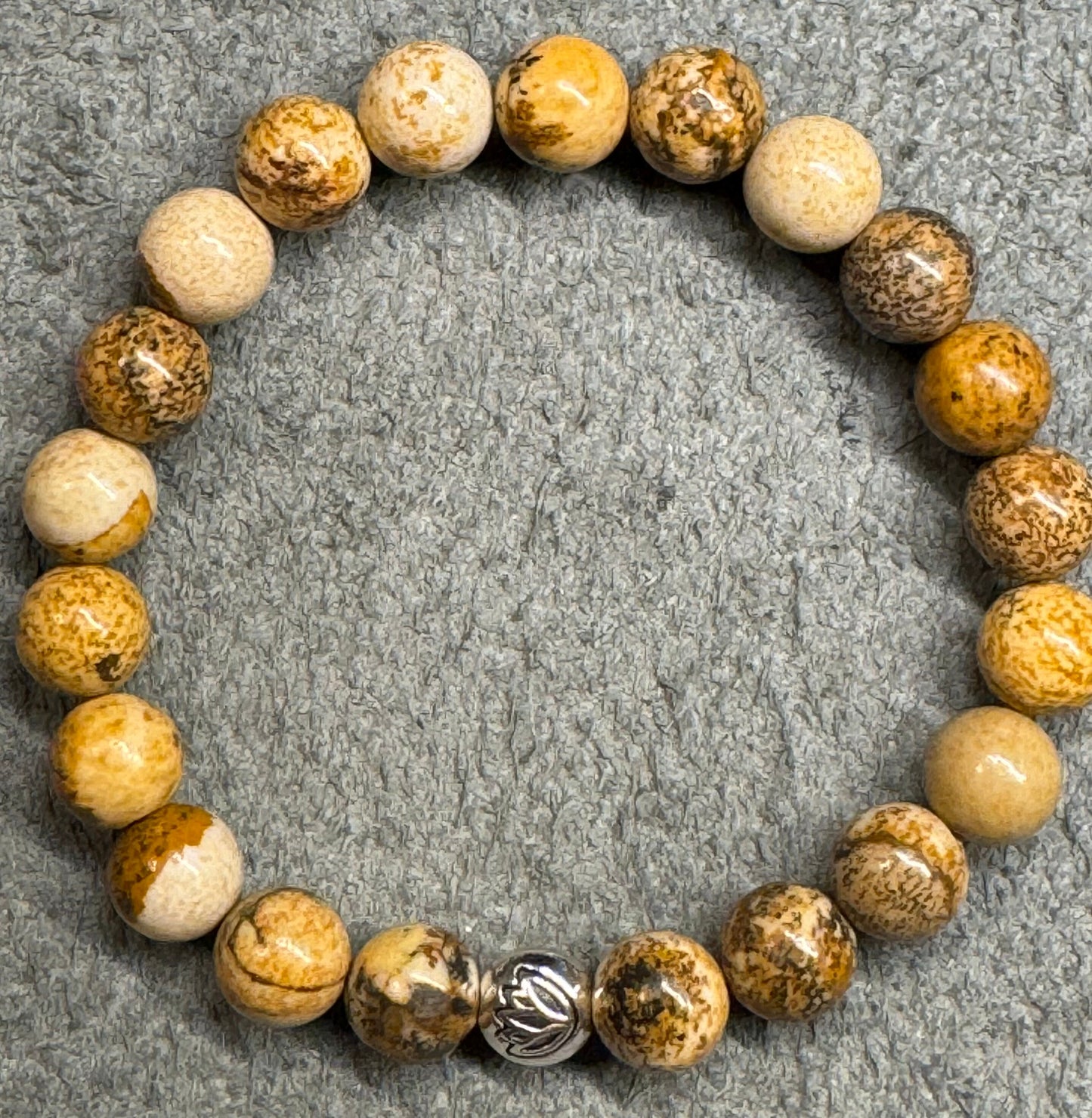 8mm Picture Jasper Beaded Stretch Bracelet with a Lotus Silver Bead.