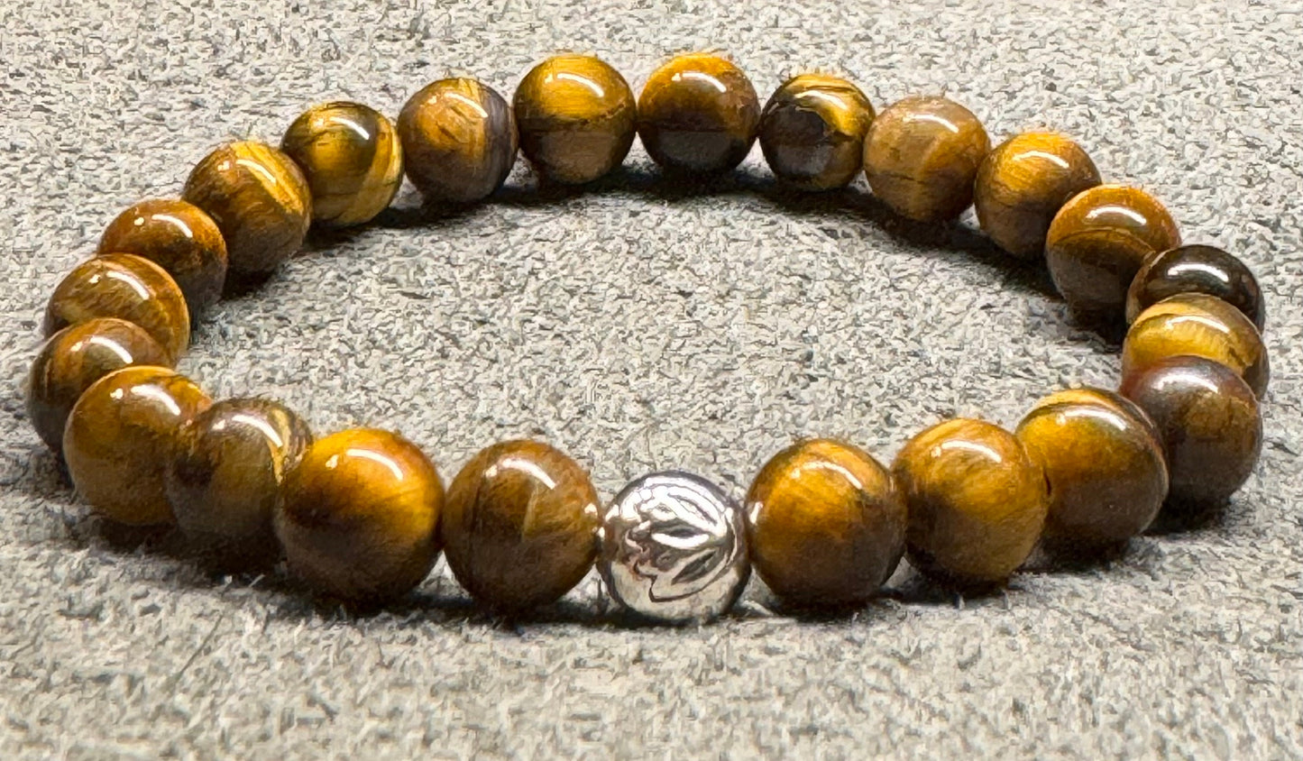 8mm Tiger's Eye Beaded Stretch Bracelet with a Lotus Silver Bead.