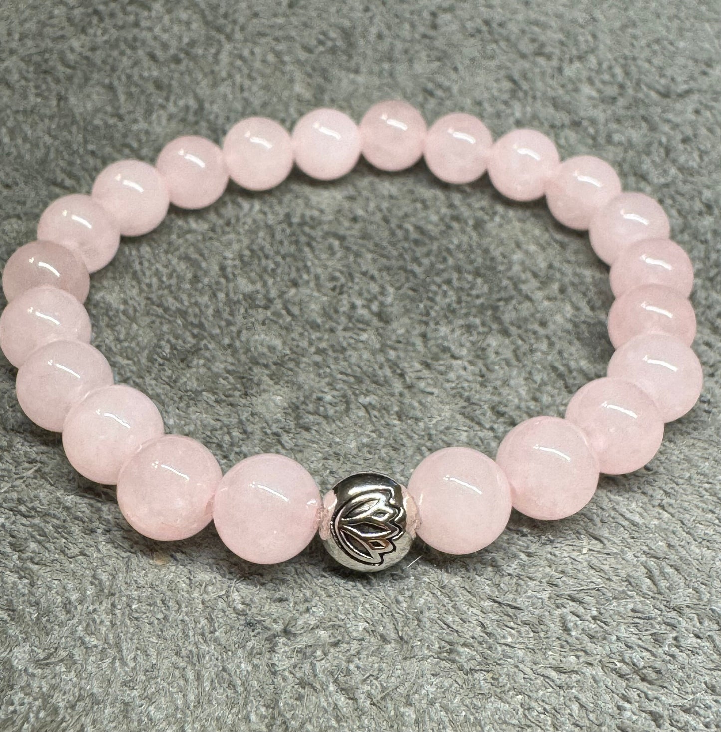 8mm Rose Quartz 8mm Gemstone Stretchy Bracelet with a Lotus Silver Bead.