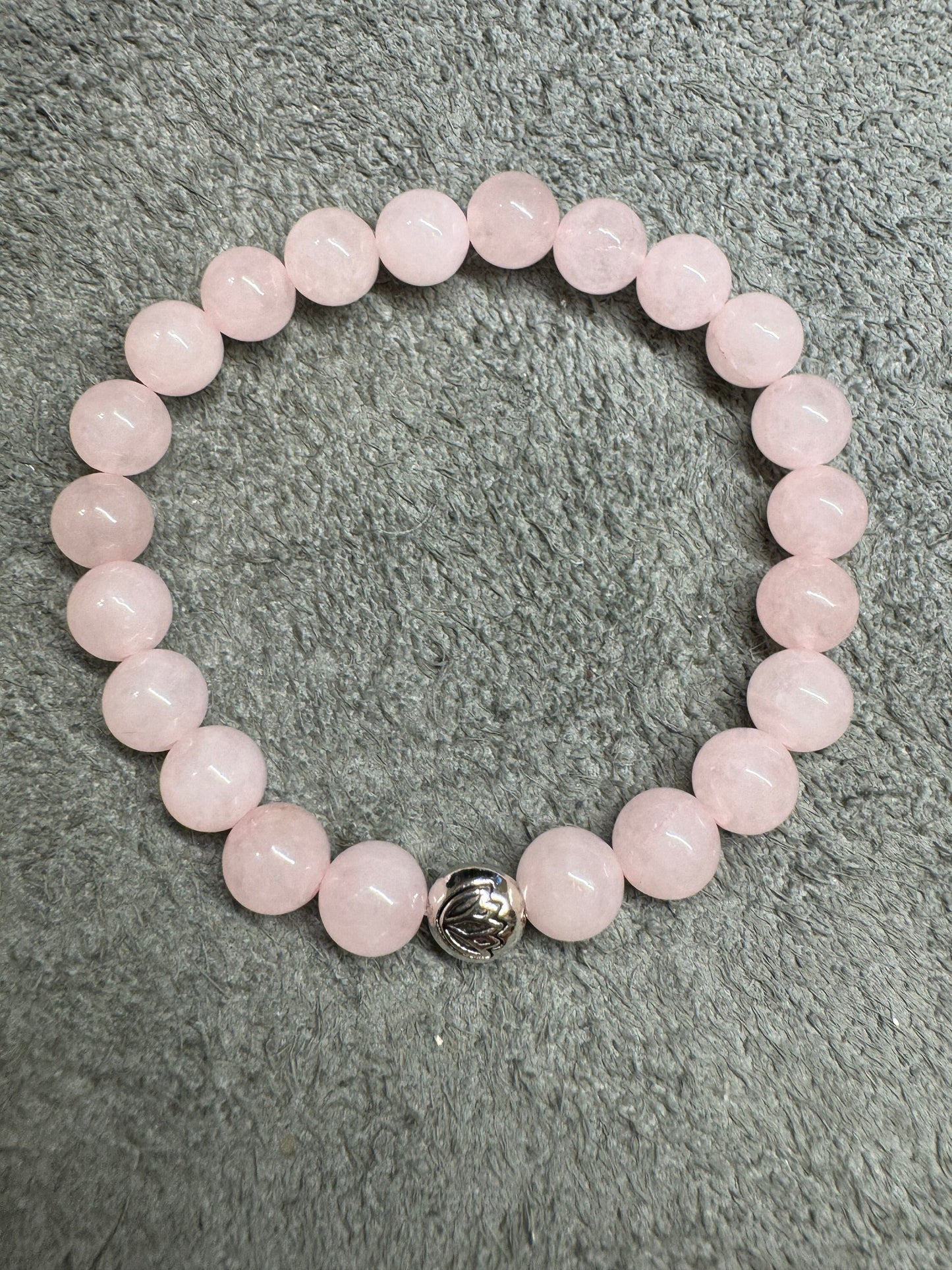 8mm Rose Quartz 8mm Gemstone Stretchy Bracelet with a Lotus Silver Bead.