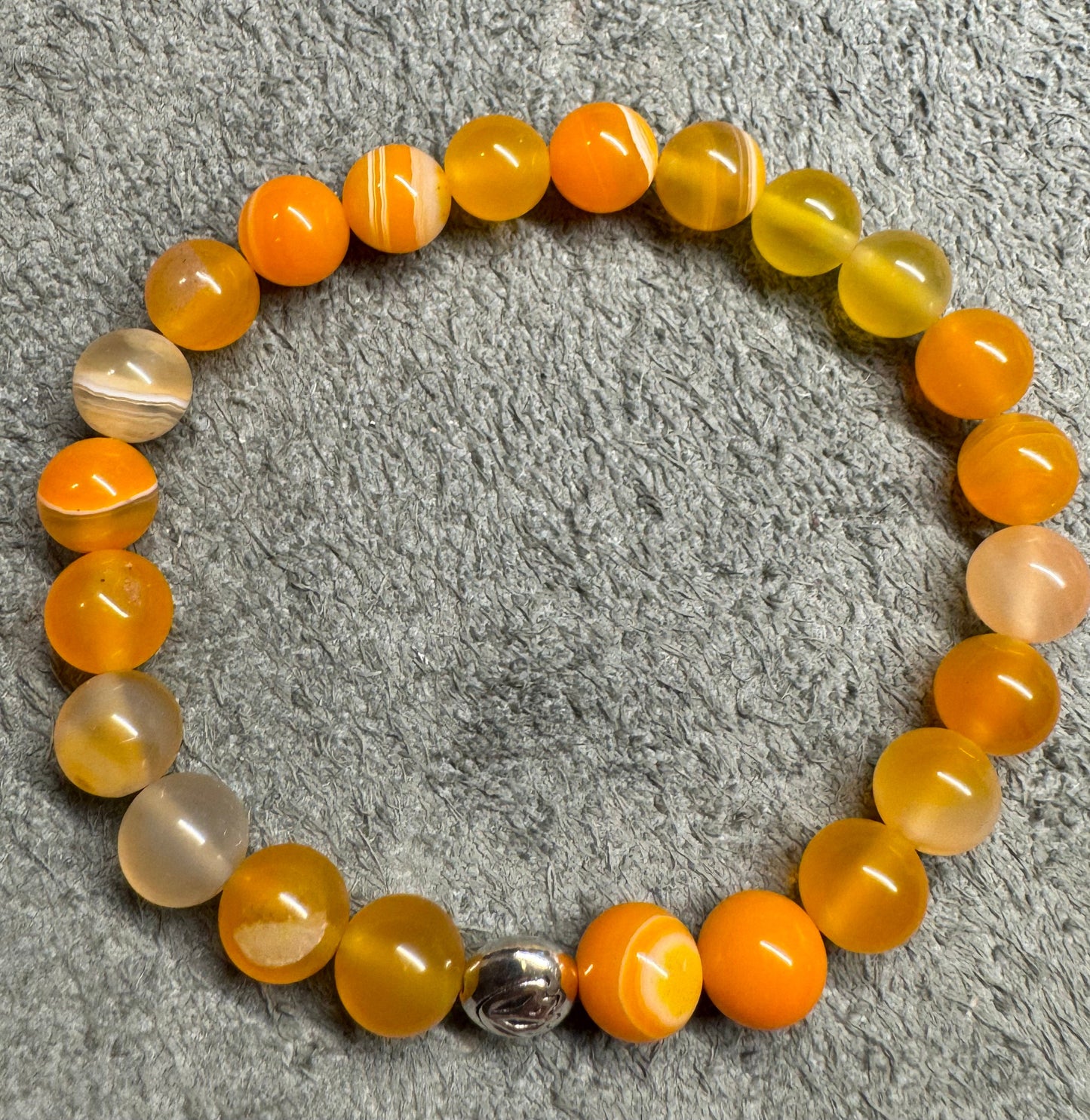 Carnelian Agate 8mm Gemstone Stretchy Bracelet with a Lotus Silver Bead.