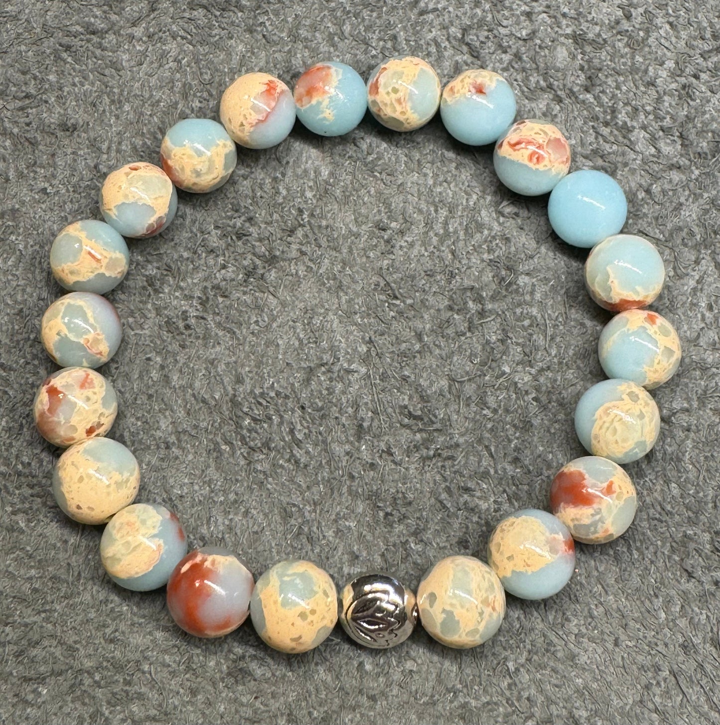 8mm Aqua Terra Jasper Beaded Gemstone Stretch Bracelet with a Lotus Silver Bead.