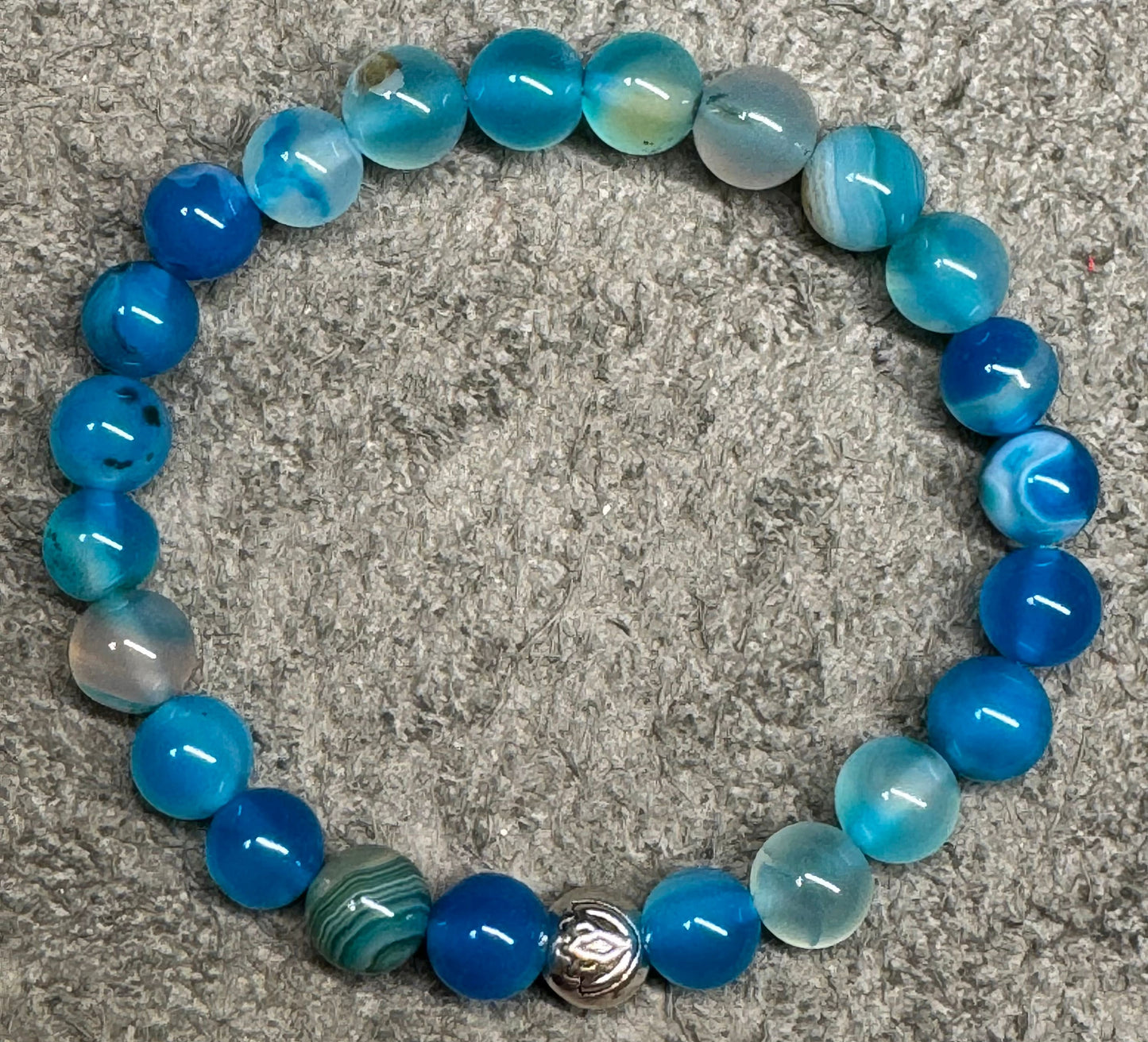 8mm Teal Dragon Vein Agate Beaded Stretch Bracelet with a Lotus Silver Bead.