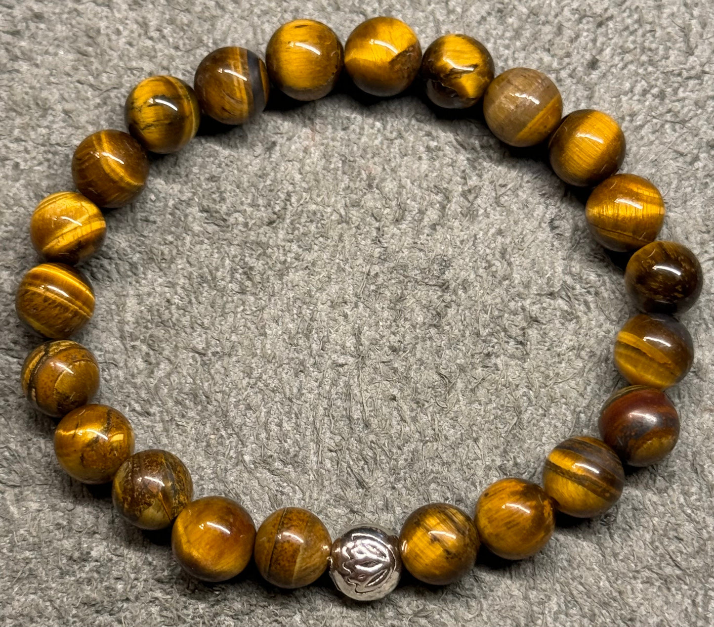 8mm Tiger's Eye Beaded Stretch Bracelet with a Lotus Silver Bead.