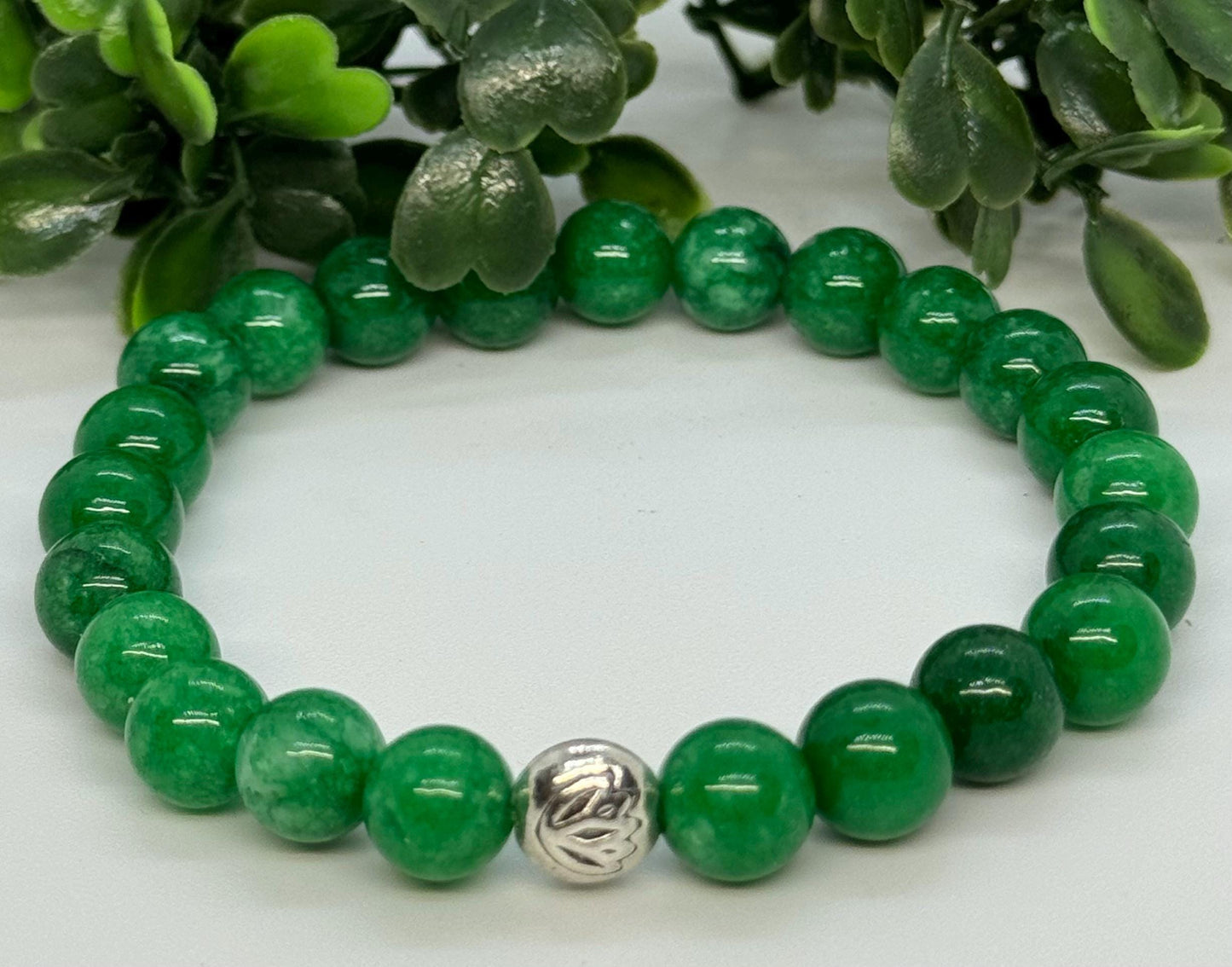 Green Onyx 8mm Gemstone Stretchy Bracelet with a Lotus Silver Bead. Strength, Focus, Resilience.