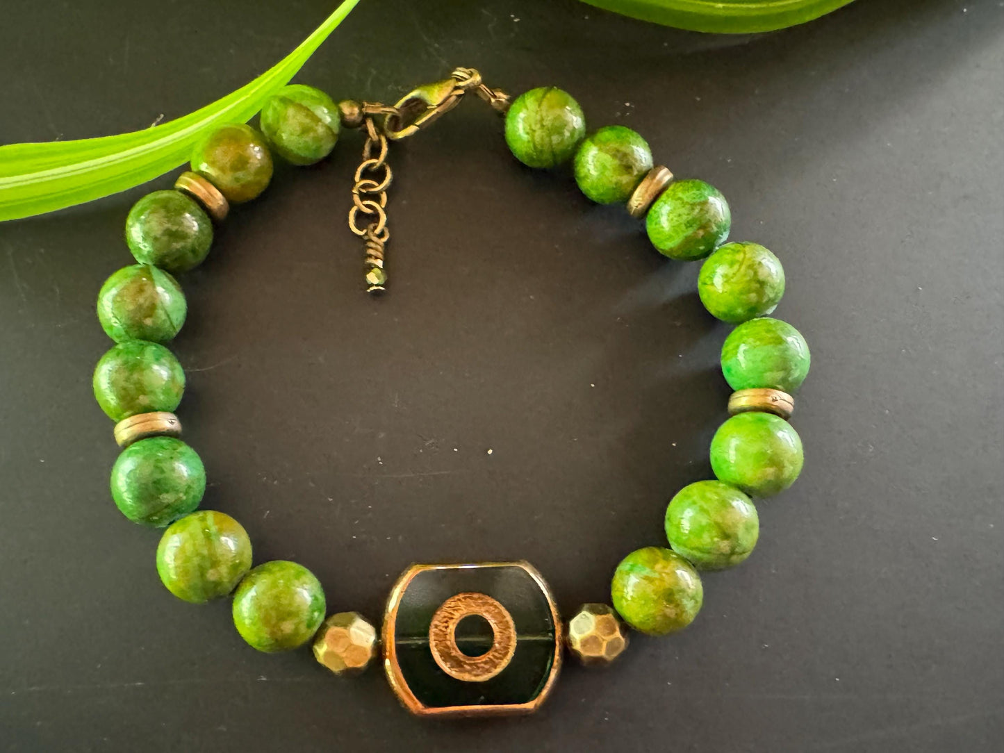 6" Prehnite Gemstone Bracelet - Prehnite Gemstone bracelet with silver spacers and hanging Seastar charm.