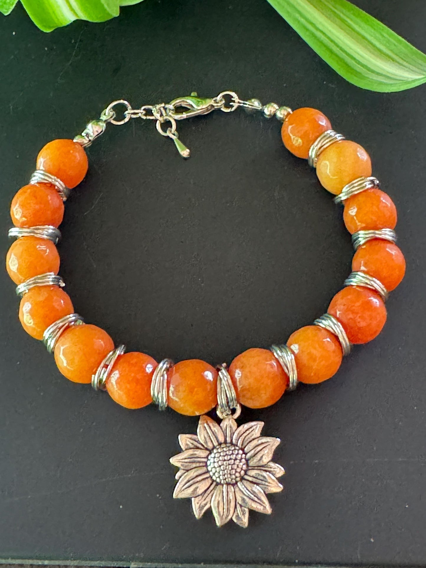 10mm Orange Aventurine Gemstone Bracelet - Orange Aventurine Gemstone bracelet with silver spacers and hanging Seastar charm.