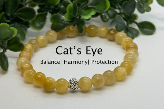 Cat's Eye Chrysoberyl 6mm Gemstone Minimalistic Stretchy Bracelet with a Flower Silver Bead. Gift for Her. Gift for Him.