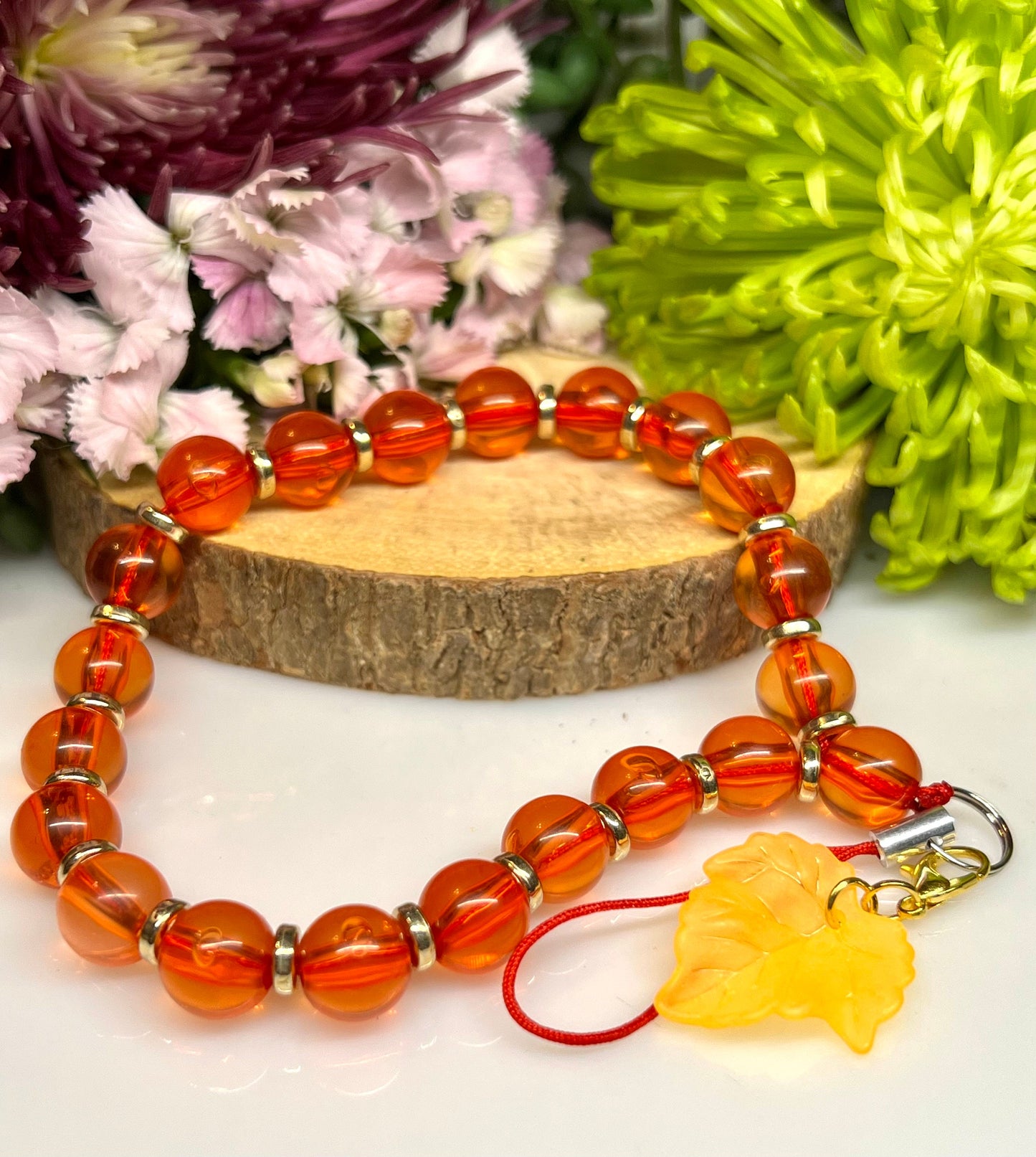 8mm Orange Glass Bead with Gold Spacer Phone Charm.