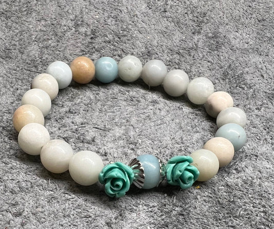 Iceland Spar Calcite 8mm bead stretchy bracelet with blue roses.