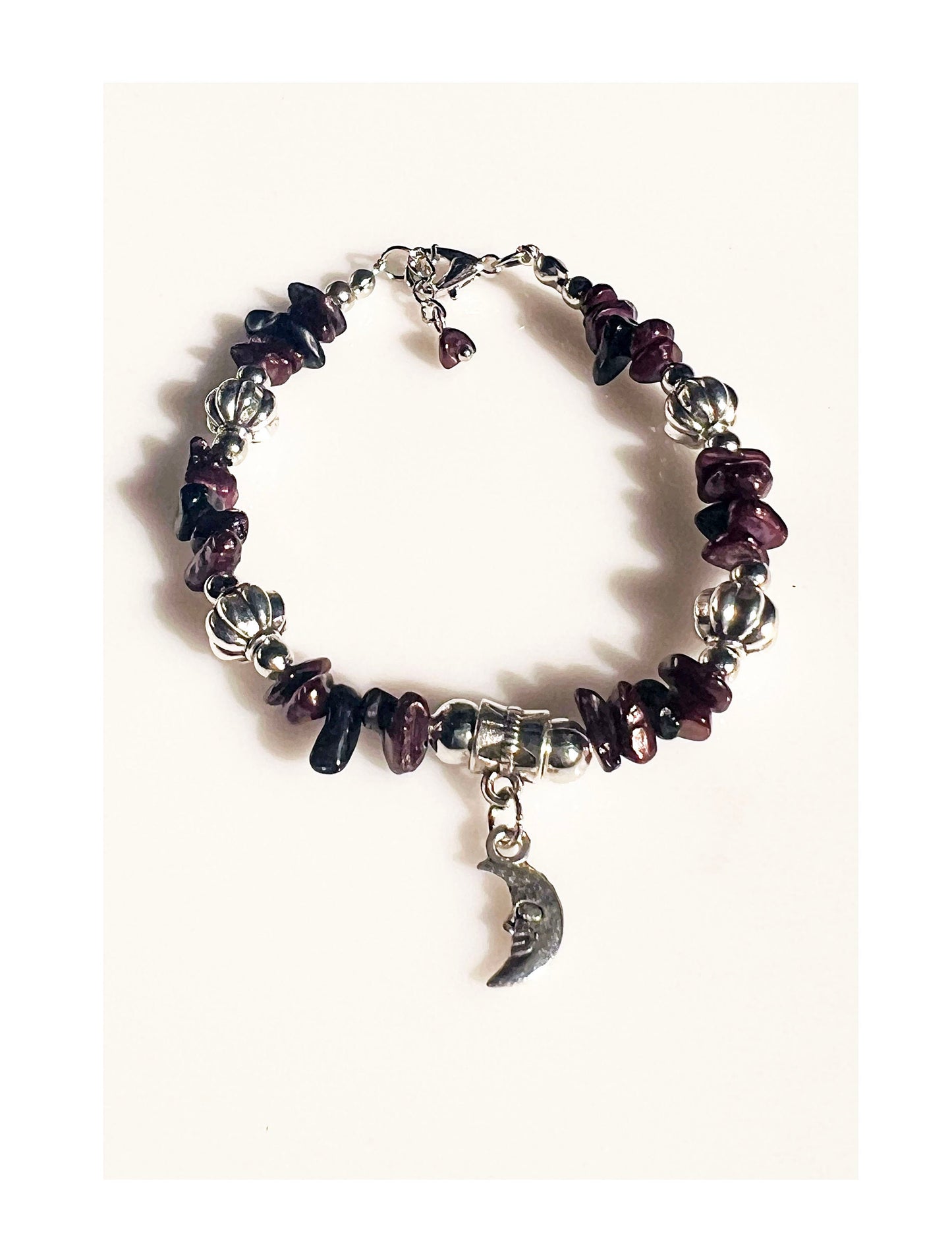 Almandine and Black Onyx Gemstone Bracelet - Almandine and Black Onyx Gemstone bracelet with silver spacers and hanging moon charm.