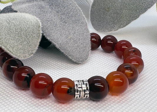 Sardonyx Carnelian Beaded Stretch Bracelet with a Silver Spacer. Vitality, Courage, Stability.