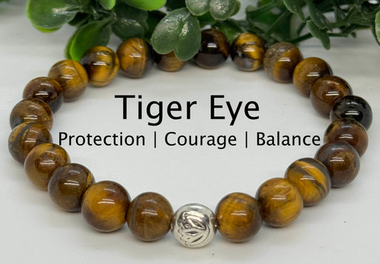 8mm Tiger's Eye Beaded Stretch Bracelet with a Lotus Silver Bead.