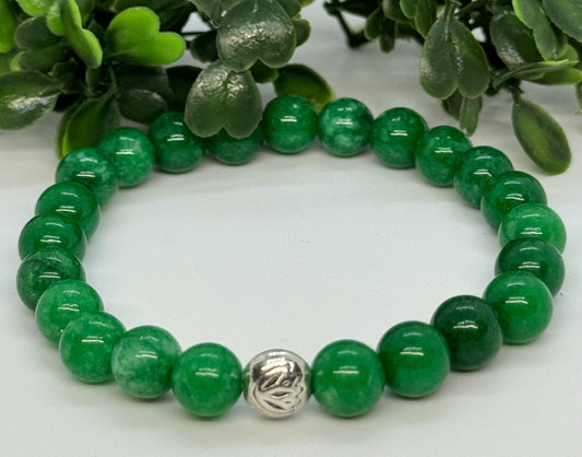 Green Onyx 8mm Gemstone Stretchy Bracelet with a Lotus Silver Bead. Strength, Focus, Resilience.