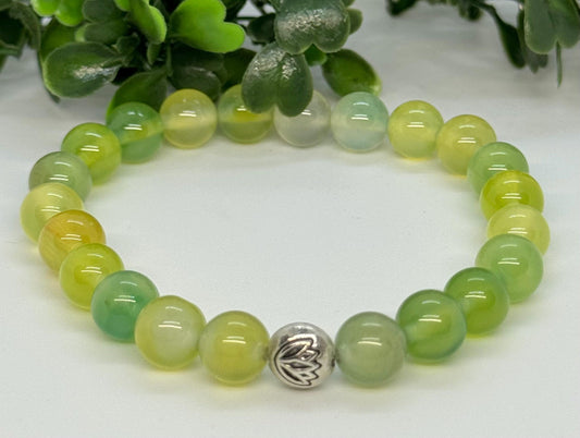 Yellow Prehnite 8mm Gemstone Stretchy Bracelet with a Lotus Silver Bead. Vitality, Healing, Transformation.